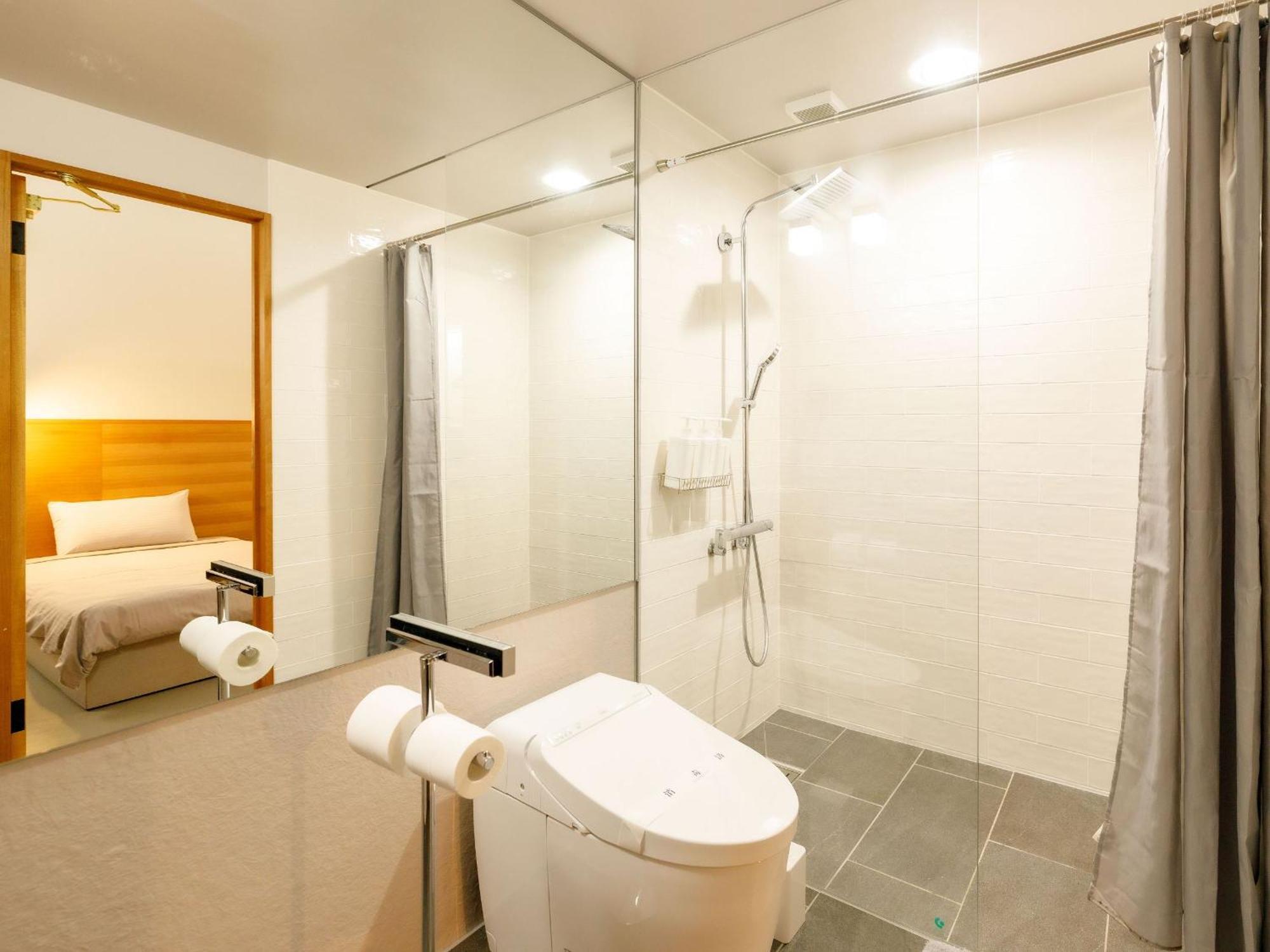 Denpaku Akakina Hotel Amami Pokoj fotografie
